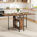 Table pliante mobile marron avec rangement integre et roulettes pour gagner de la place